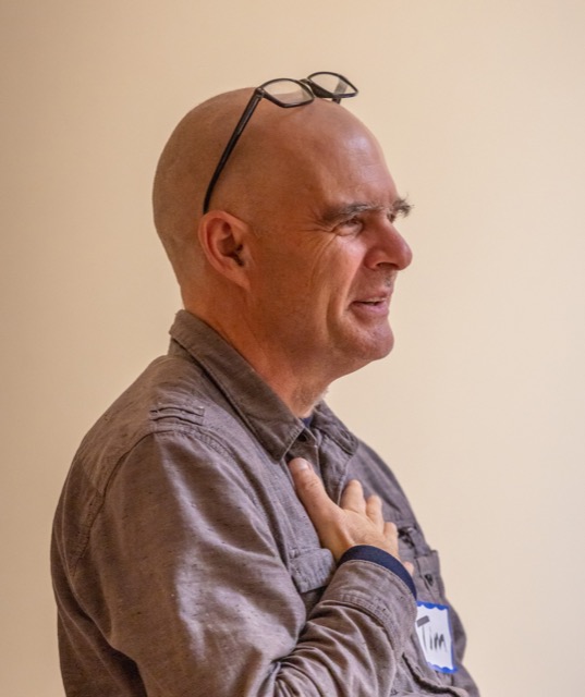 Tim teaching hand on heart - cropped-640 Tim Burnett teaching, hand on heart